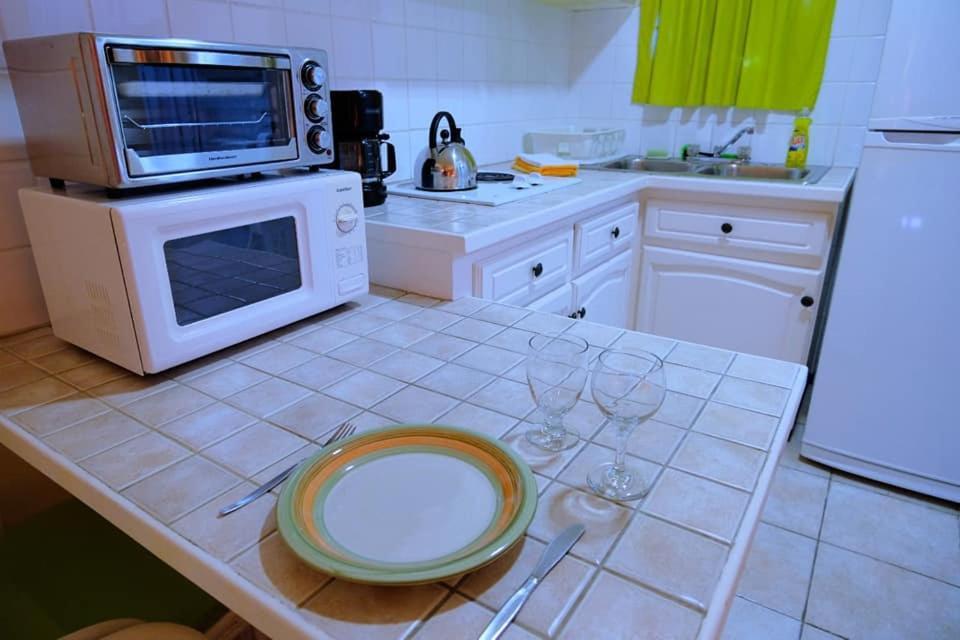 Aruba Quality Apartments & Suites Палм Бич Экстерьер фото